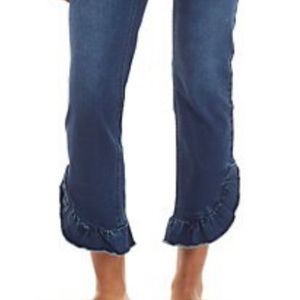Crown & Ivy jeans with ruffle cut bottom.